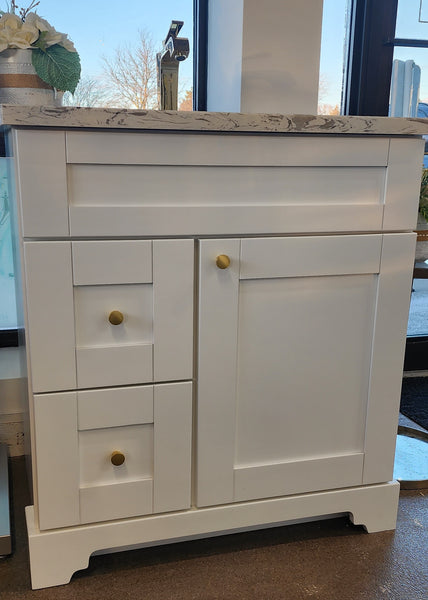 30" White Vanity with Quartz top and Sink $600
