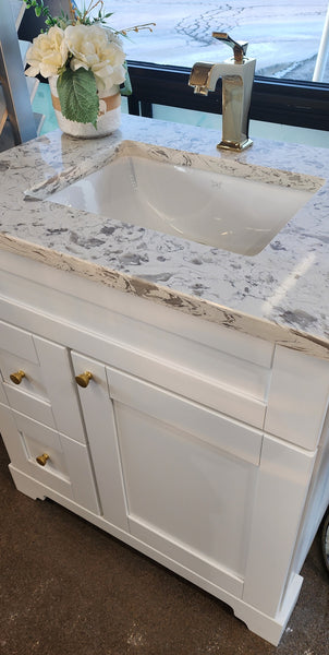 30" White Vanity with Quartz top and Sink $600